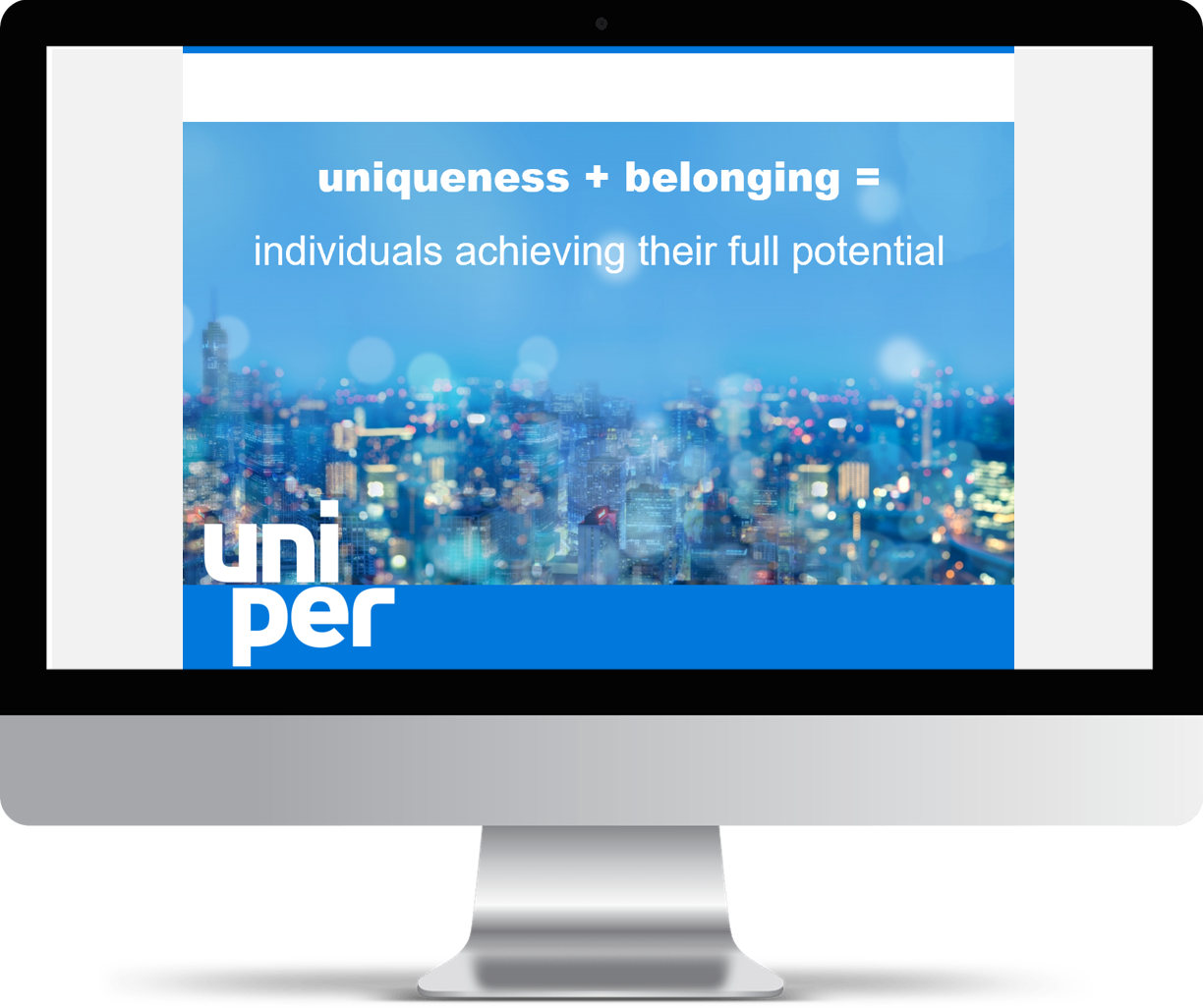 Computer monitor with an Uniper 'Uniqueness + belonging = individuals achieving their full potential' screen